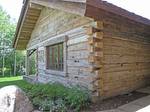 Hand-Hewn Timbers Stacked with Dove-Tail Joints